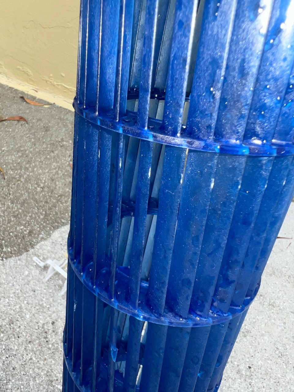 Clean HVAC blower wheel after maintenance to support airflow and cooling performance by Tri-County HVAC.