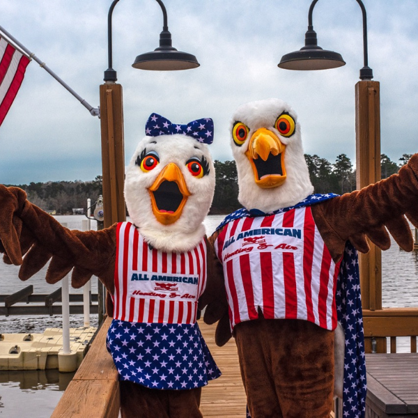All American Heating and Air mascots, Baldie and Daisy
