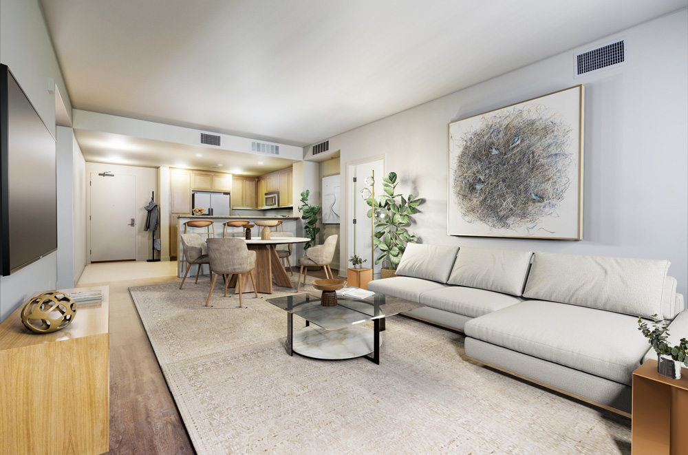 Vinyl-floored living room with couch, coffee table, informal dining room, and view to kitchen.