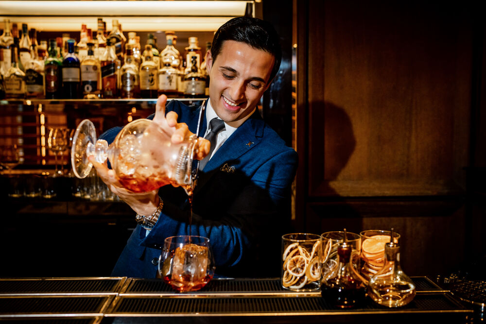 Bar Manager preparing classic Negroni