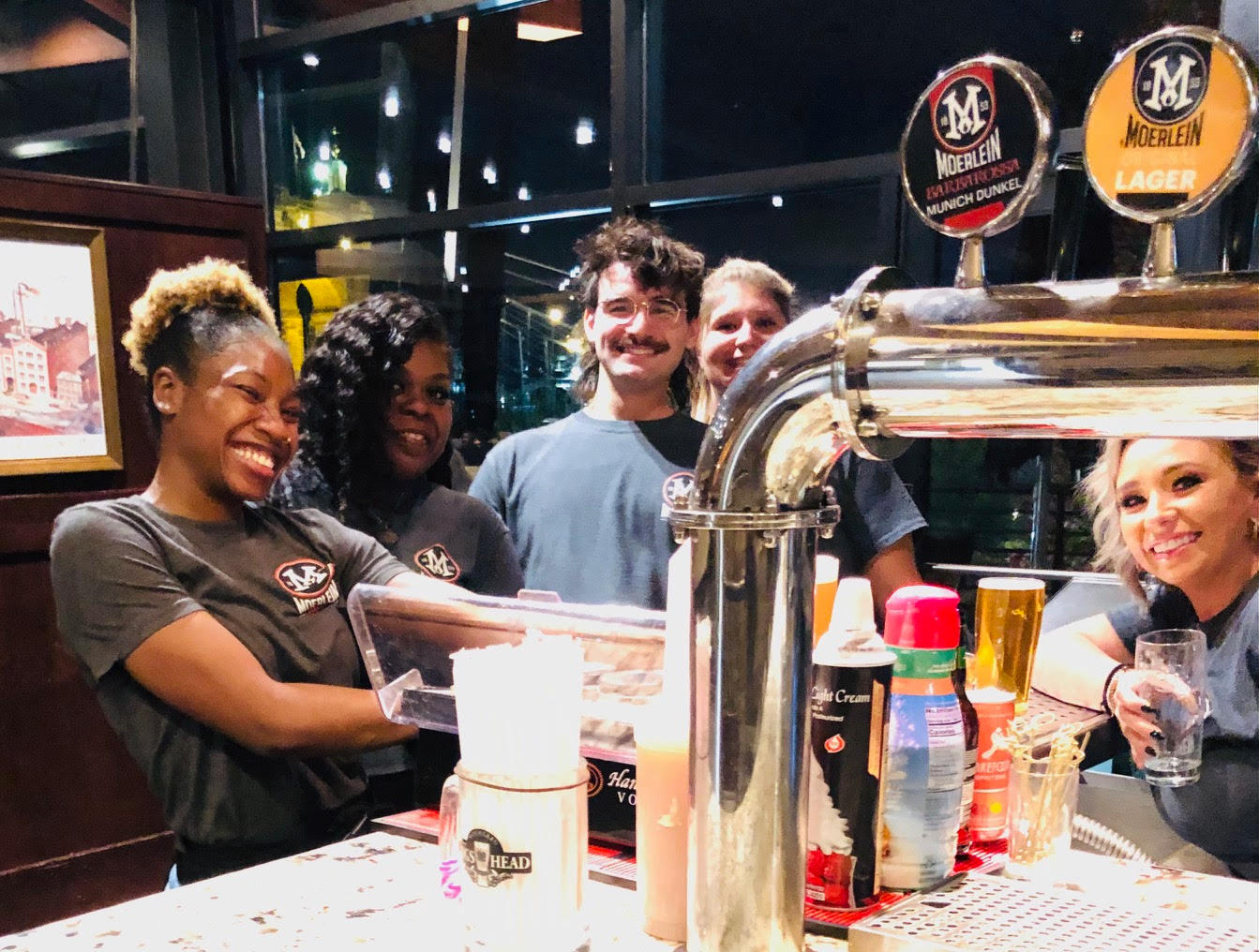 Staff and guests having fun at Moerlein Lager House.