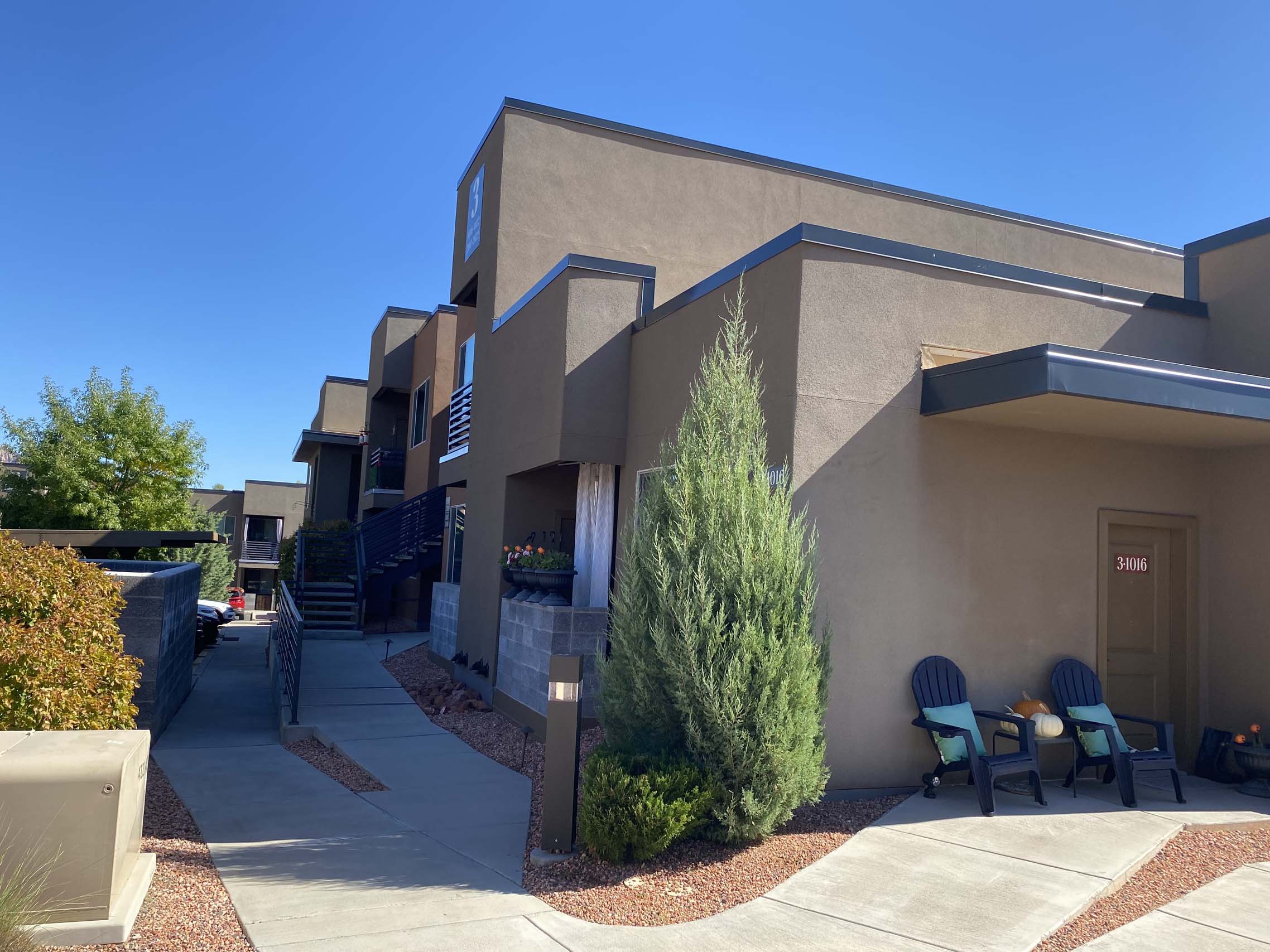 Modern apartment buildings with courtyard walkway