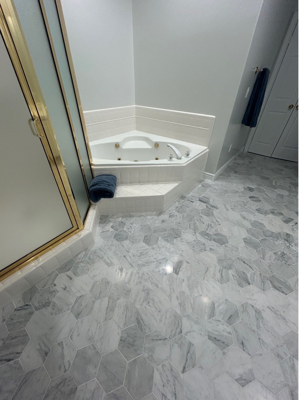 Bathroom floors and bathtub cleaned by the house cleaning company, Real Clean.