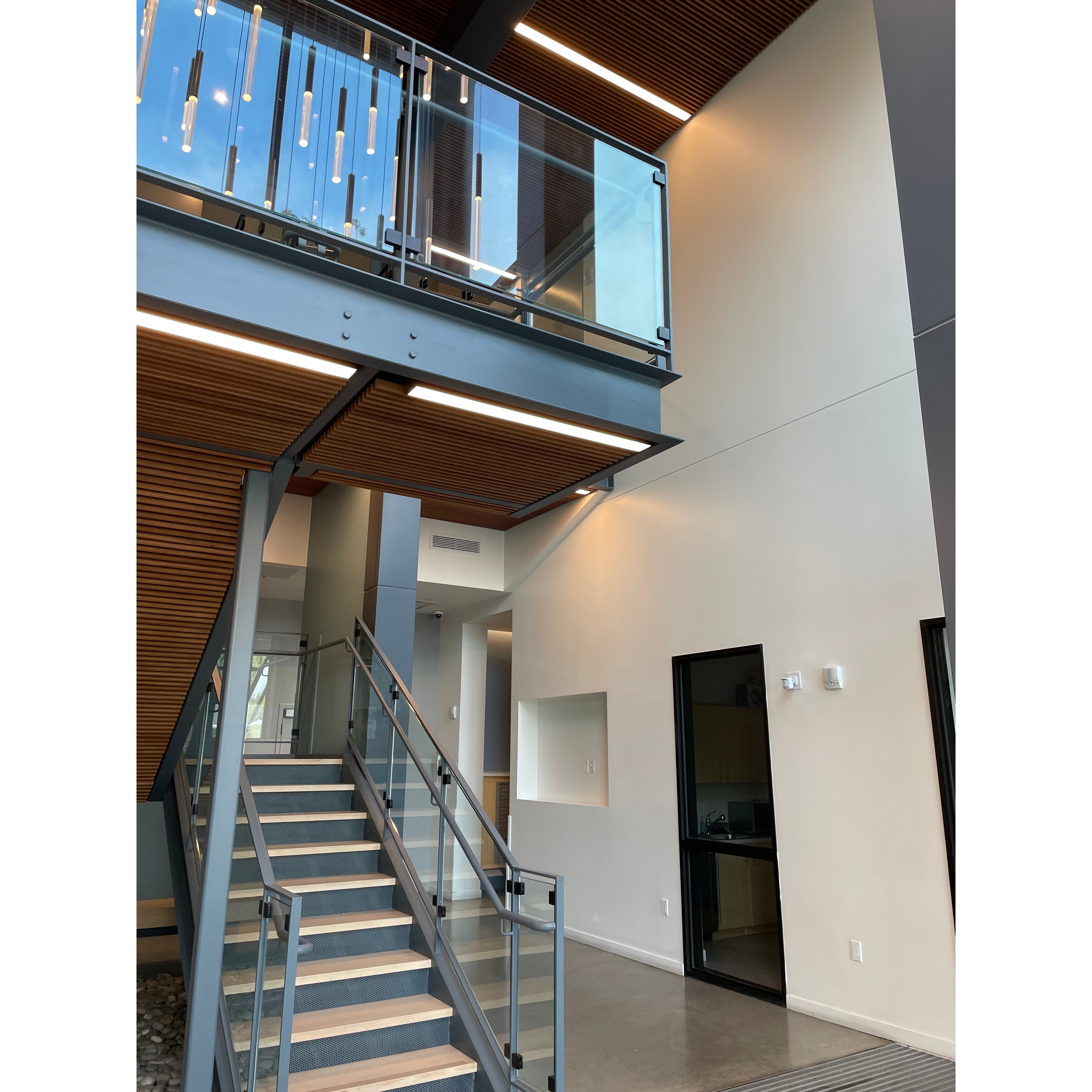 Multi-story commercial building lobby and stairwell kept clean and inviting by Star's Janitorial Services commercial cleaning crews.