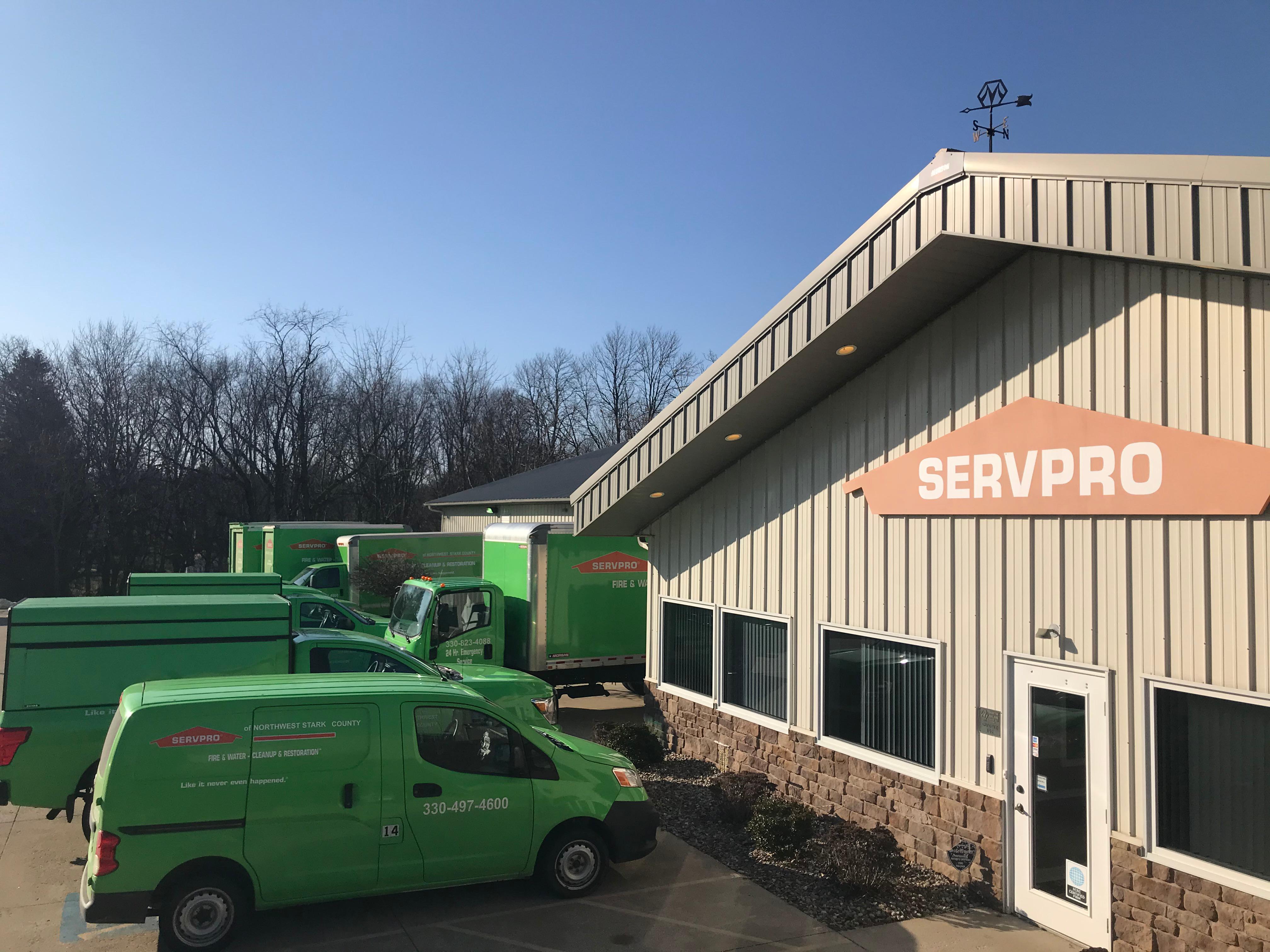 SERVPRO of Northwest Stark County Building and Trucks.