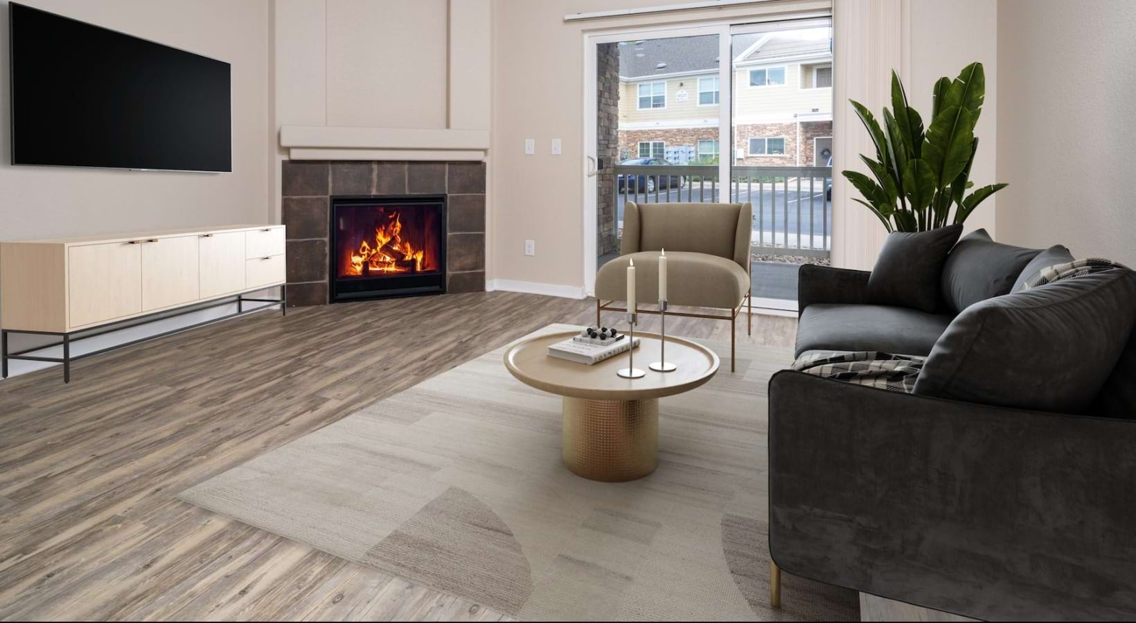 Living Room with Fireplace at Kipling Commons Apartments