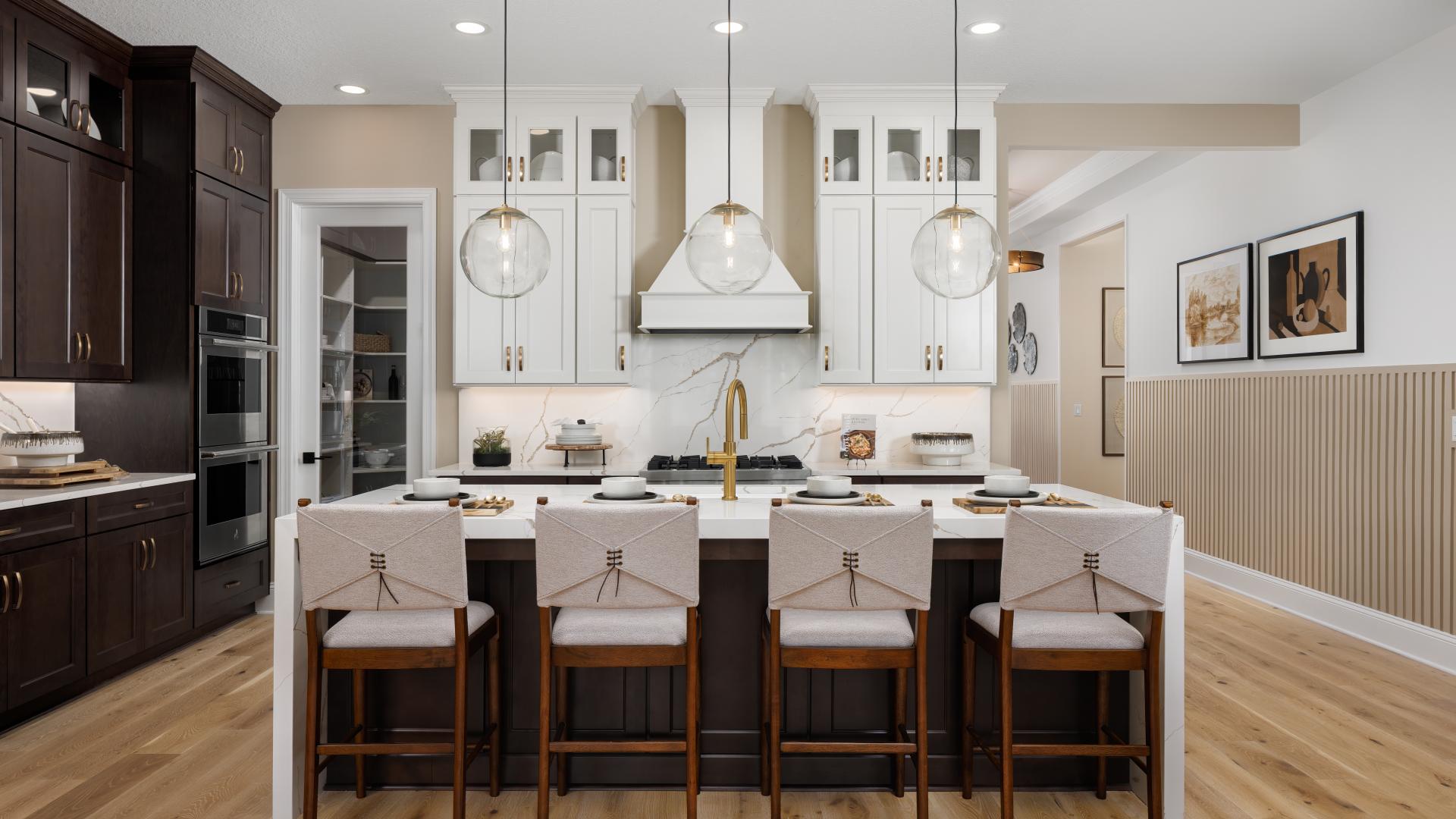 Well-appointed kitchens with large center islands and ample seating