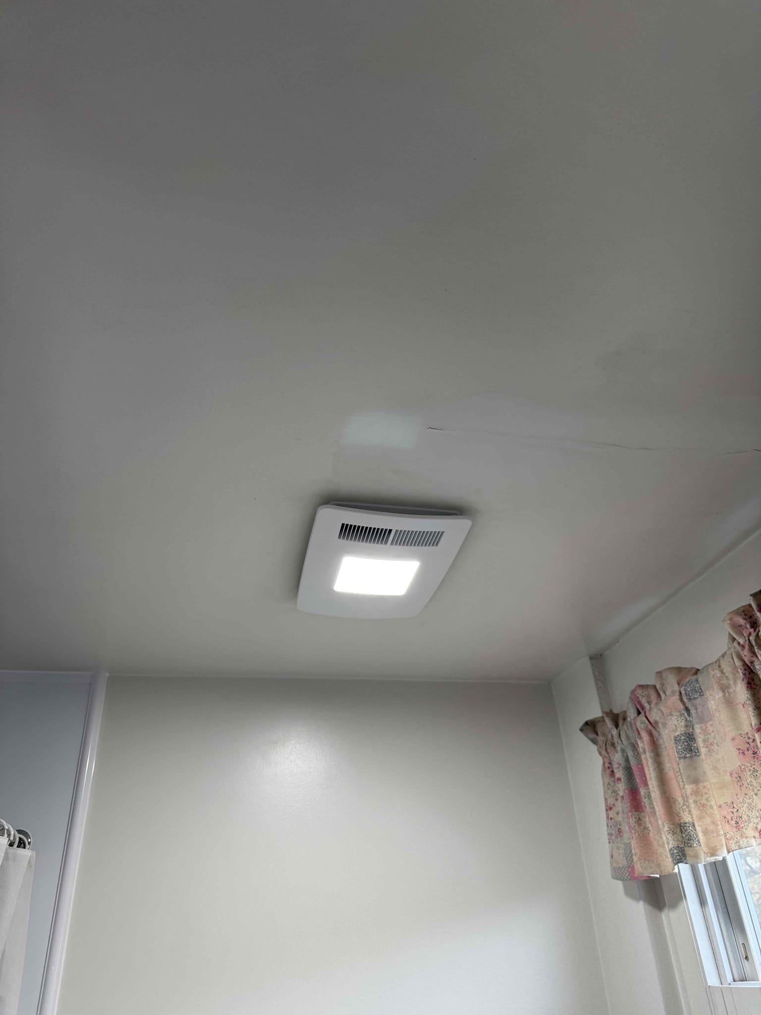 Thomas Edison Electric installed this bathroom exhaust fan with integrated LED light panel in a Bryn Mawr, PA home. The combination unit improves ventilation and provides bright, even lighting in the bathroom.