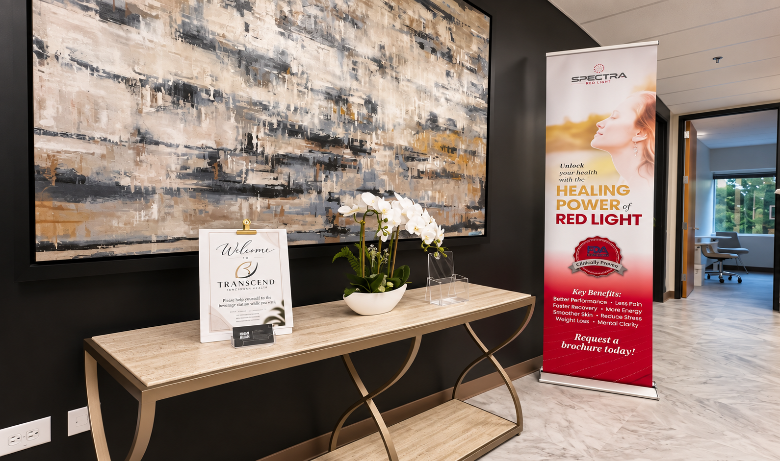Welcoming reception area at Transcend Functional Health in Greenwood Village, featuring contemporary artwork, elegant furnishings, and a calm, modern atmosphere for patients.