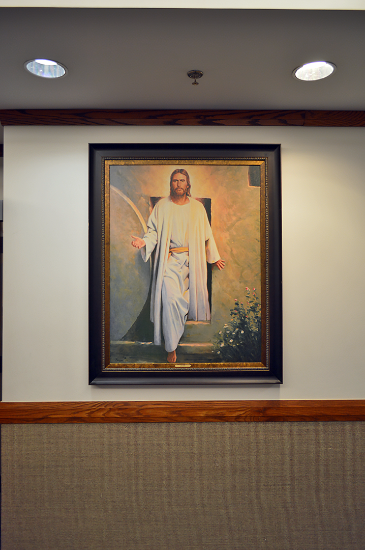 A large portrait of Jesus Christ, the author of our salvation, the giver of eternal life, the chief cornerstone of the Church which bears His name, The Church of Jesus Christ of Latter-day Saints. There is none to equal Him.