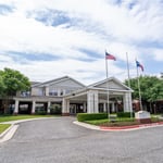 The Heritage Tomball Senior Living Logo