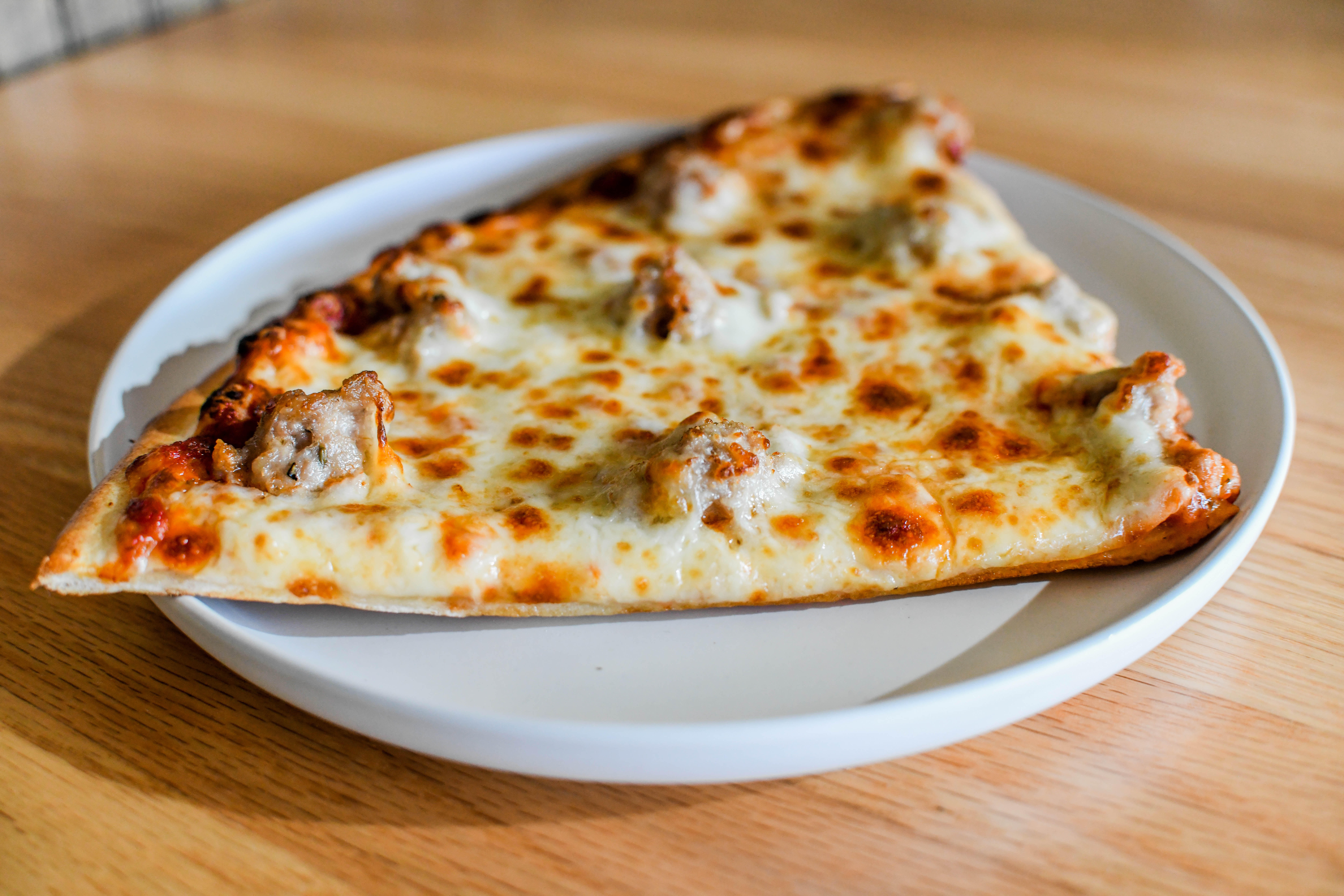 Get cheese, pepperoni or sausage slices for lunch! Red's Savoy Pizza Rochester (507)206-3031