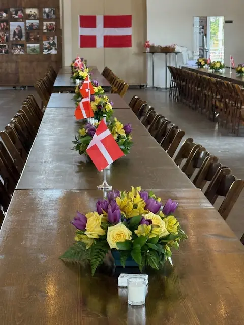 Professional event planner consulting with family at a memorial service