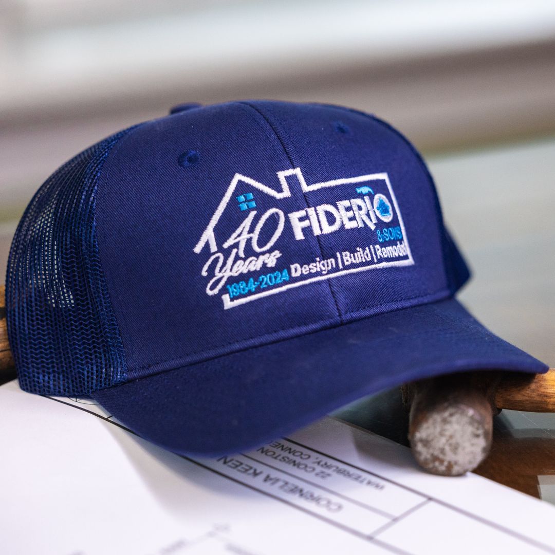 Detailed view of Fiderio’s commemorative 40th anniversary hat showcasing the company’s milestone legacy.