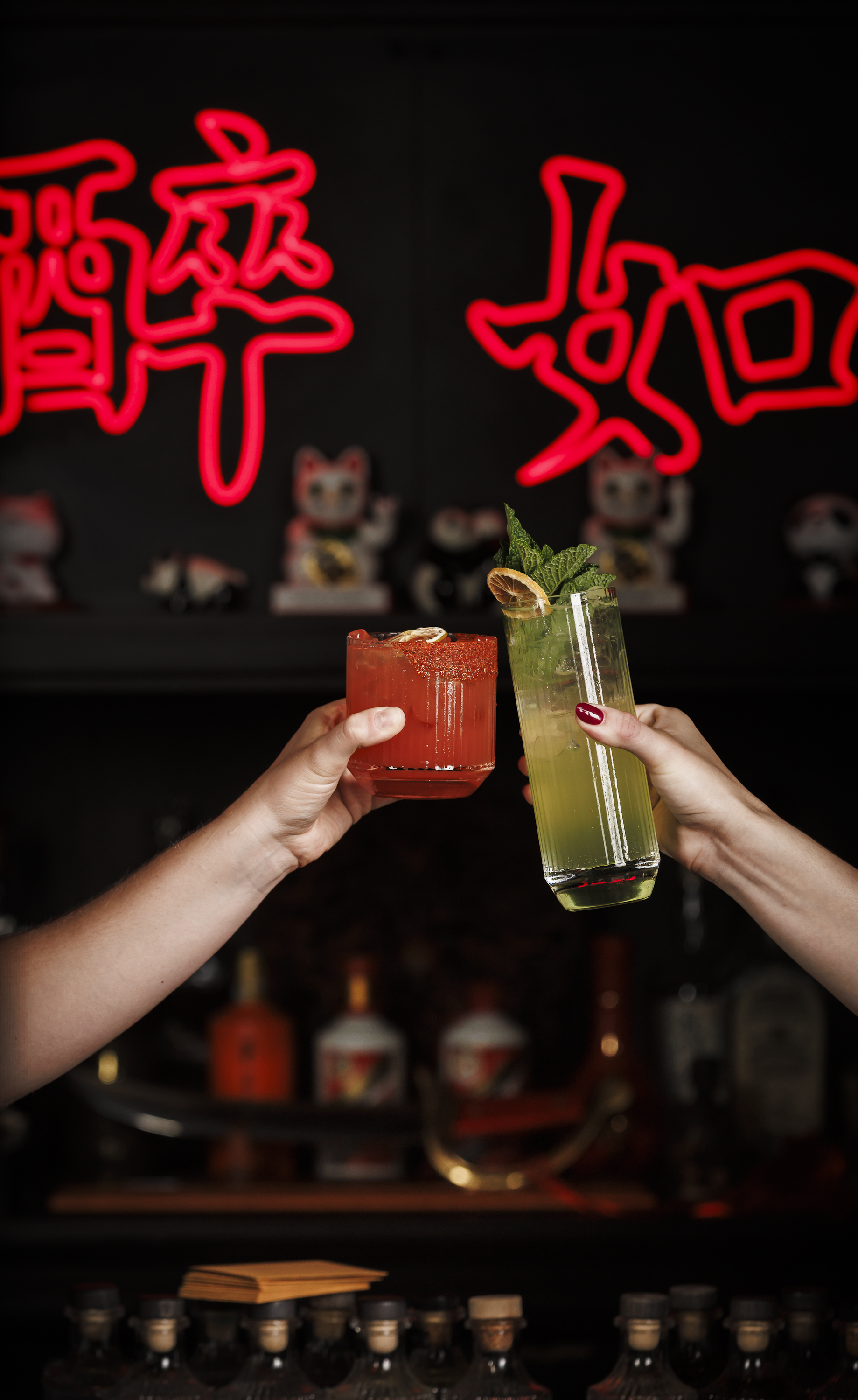 Discover signature cocktails at Mr. H in Boston’s Seaport District. Enjoy the Coral Haze with mezcal 