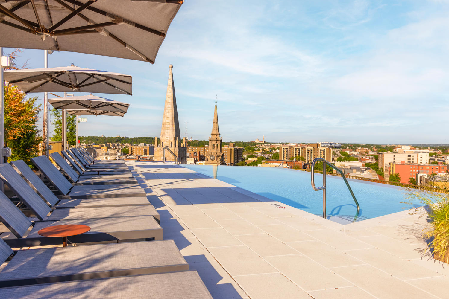 A quintessential rooftop deck boasting expansive city views