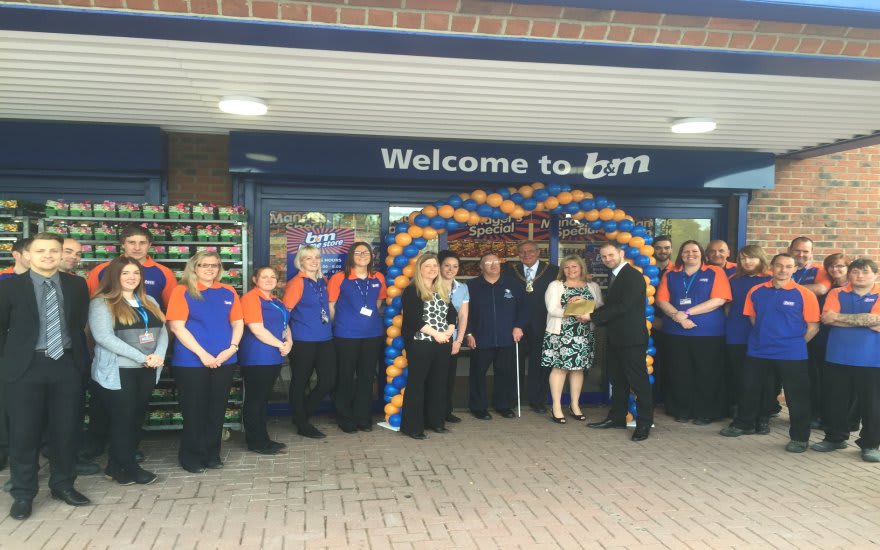Representatives of Hull and East Yorkshire Royal Institute for the Blind is joined by Councillor Peter Turner who officially opened the new Willerby store.