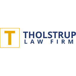 The Tholstrup Law Firm, L.P. Logo