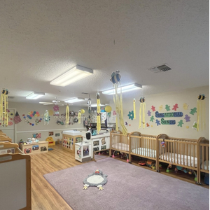 Bright and colorful preschool classroom at Childcare Network with age-appropriate learning materials