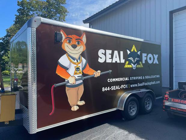 Images SealFox Asphalt *Commercial Striping & Sealcoating
