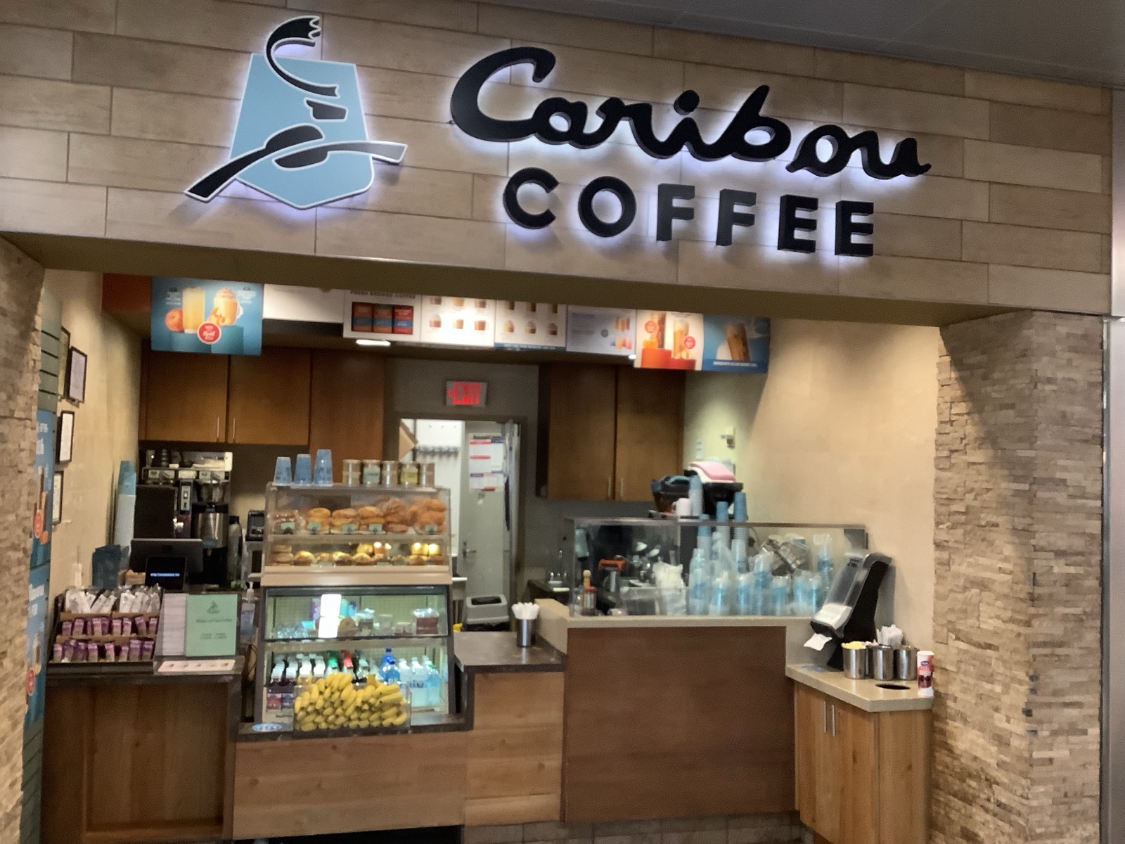 Storefront of the Caribou Coffee at 6000 North Terminal Parkway in Atlanta