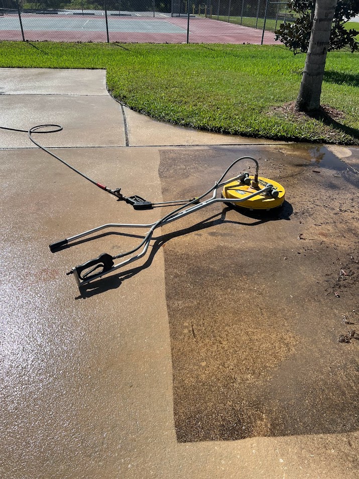 Professional driveway pressure washing in St. Cloud, FL removes dirt, algae, mildew, grime, and weather buildup to restore cleaner, brighter concrete.