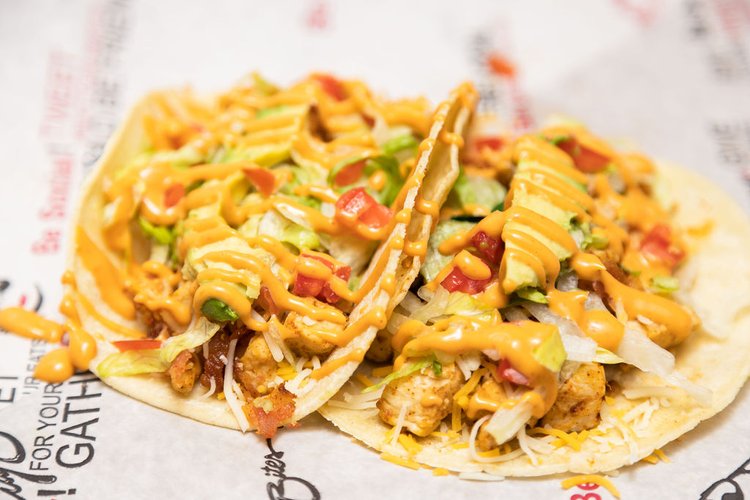 Chicken topped with bacon, shredded cheddar, sliced avocado, lettuce, tomatoes & chipotle sauce.