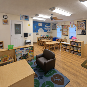 Bright and colorful preschool classroom at Childcare Network with age-appropriate learning materials