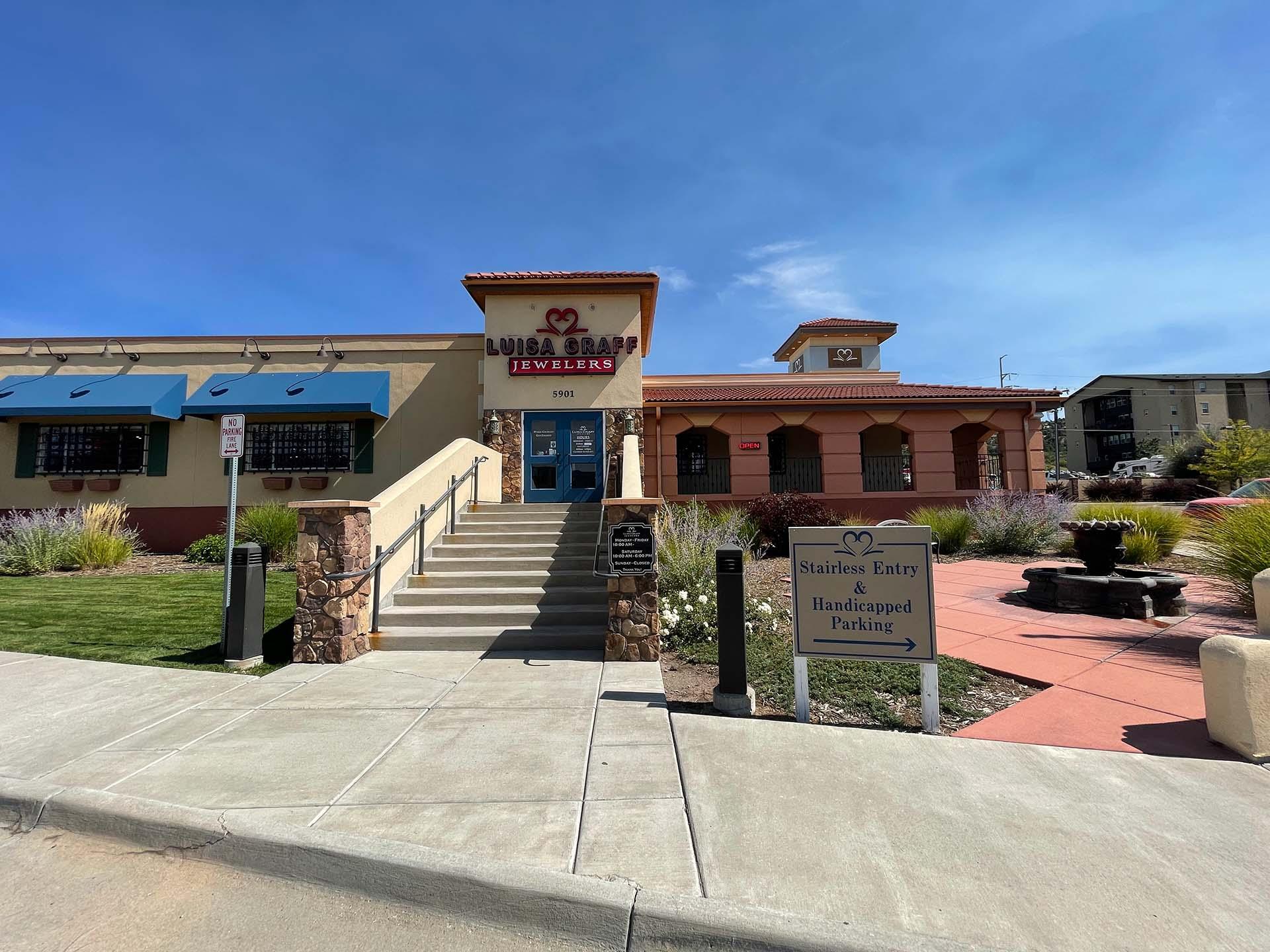 Luisa Graff Jewelers close front of the building showing fountain