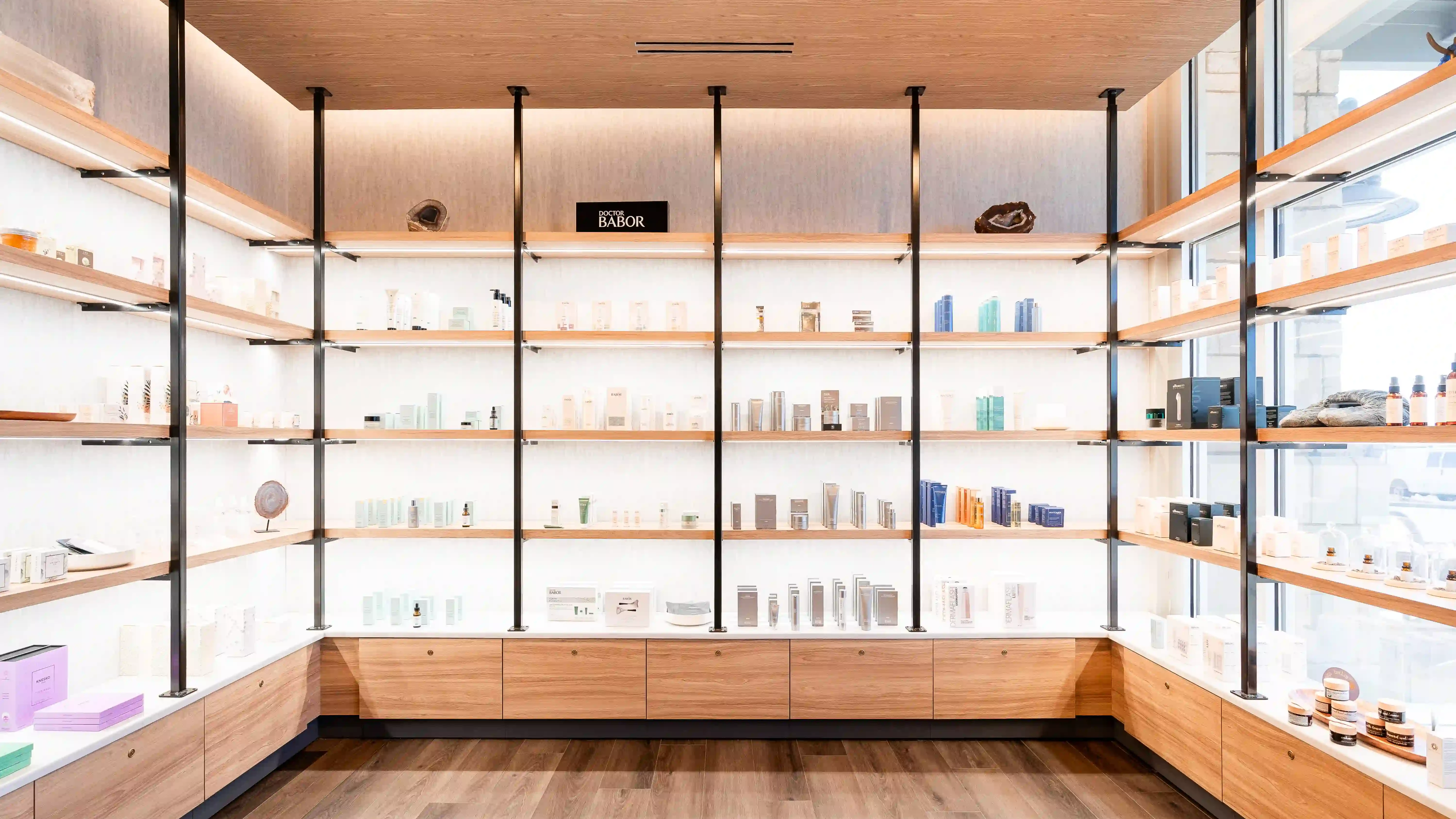 Exclusive Club member retail space with premium skincare products and spa accessories