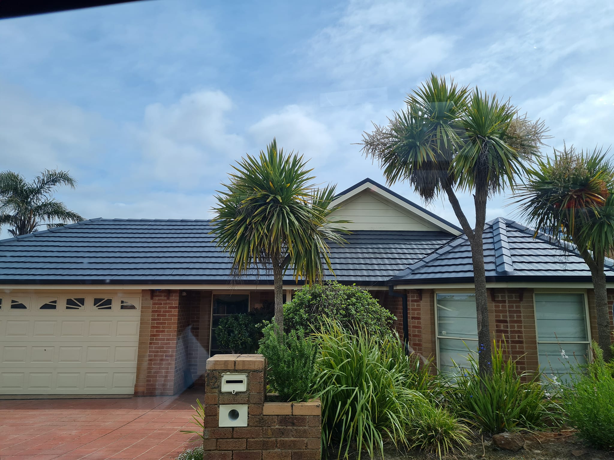 Images Enhanced Paint and Roof Restoration