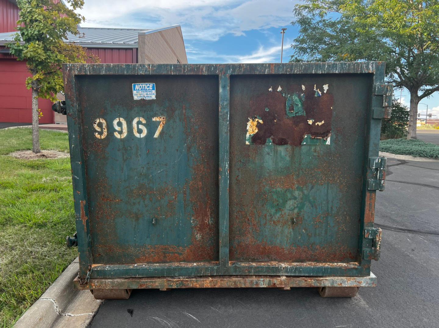 Green roll off dumpster in Parker, CO. Discount Dumpster