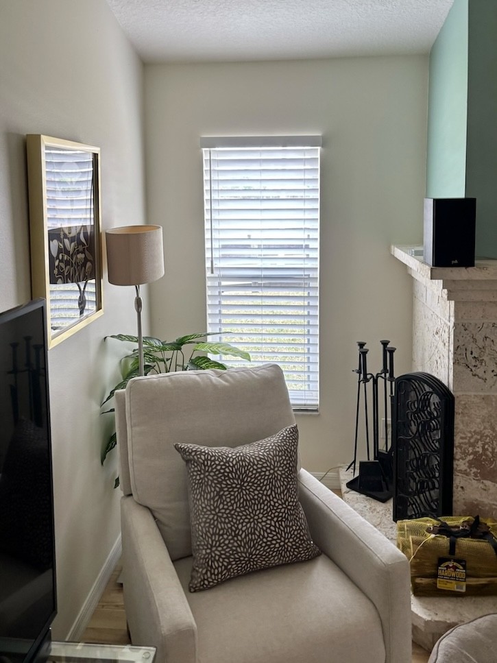 Give your home a homey, cozy feel with our faux wood blinds! Not only do these classic blinds complement this local Vero Beach living space, but they also provide optimal functionality through their light control abilities.
