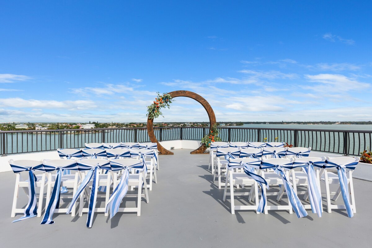 Rooftop wedding ceremony setup overlooking the waterfront at FUSION Resort in Treasure Island, Florida.