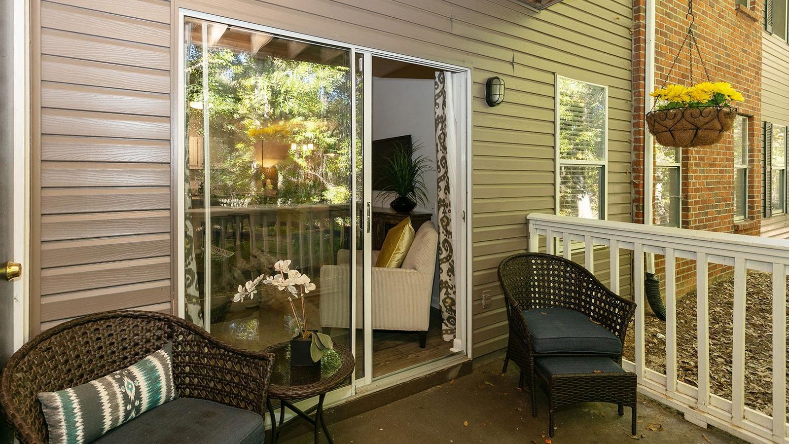 Sliding glass door to relaxing outdoor patio.