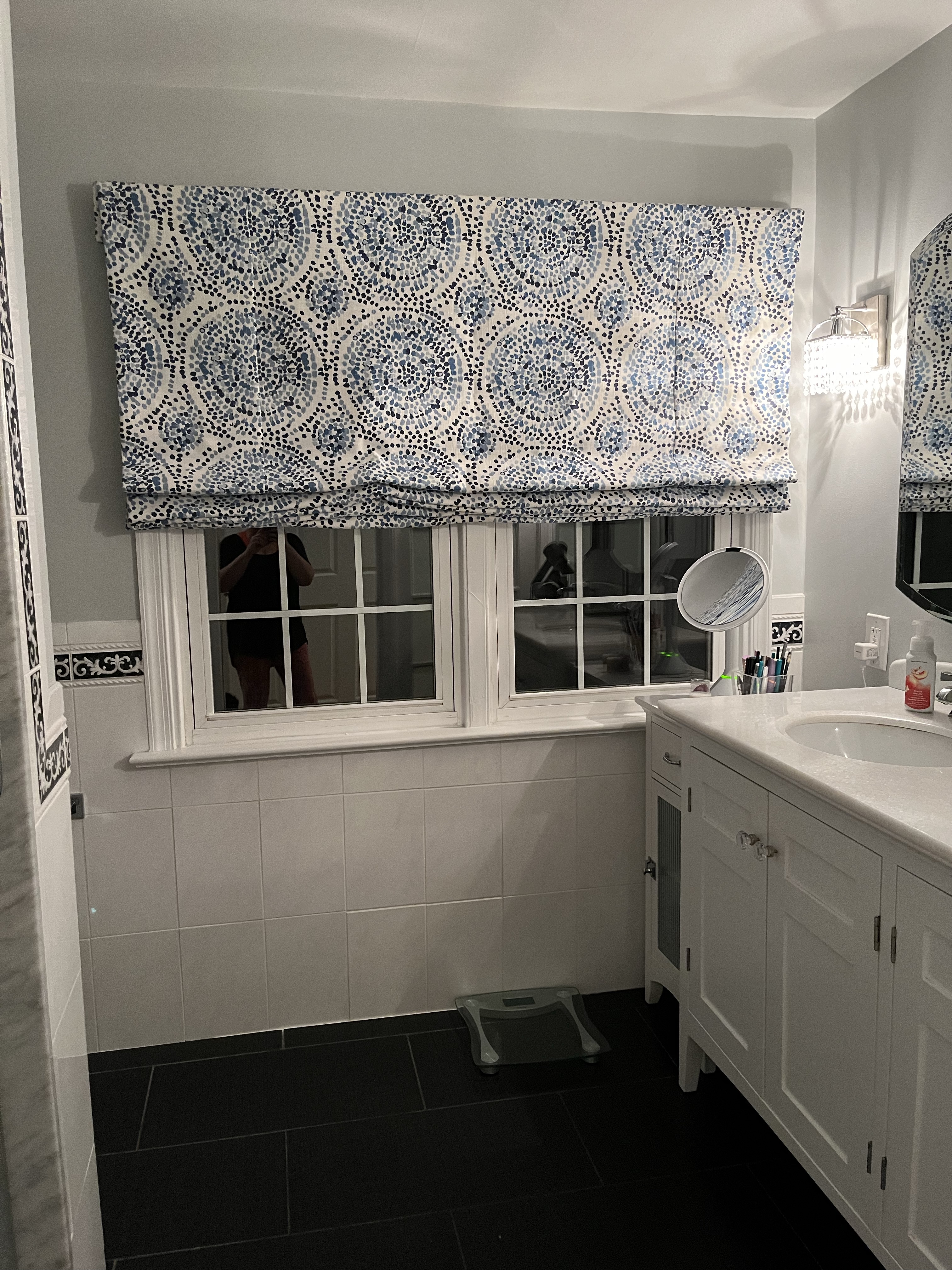 Bathroom roller shade adds a crisp finish!