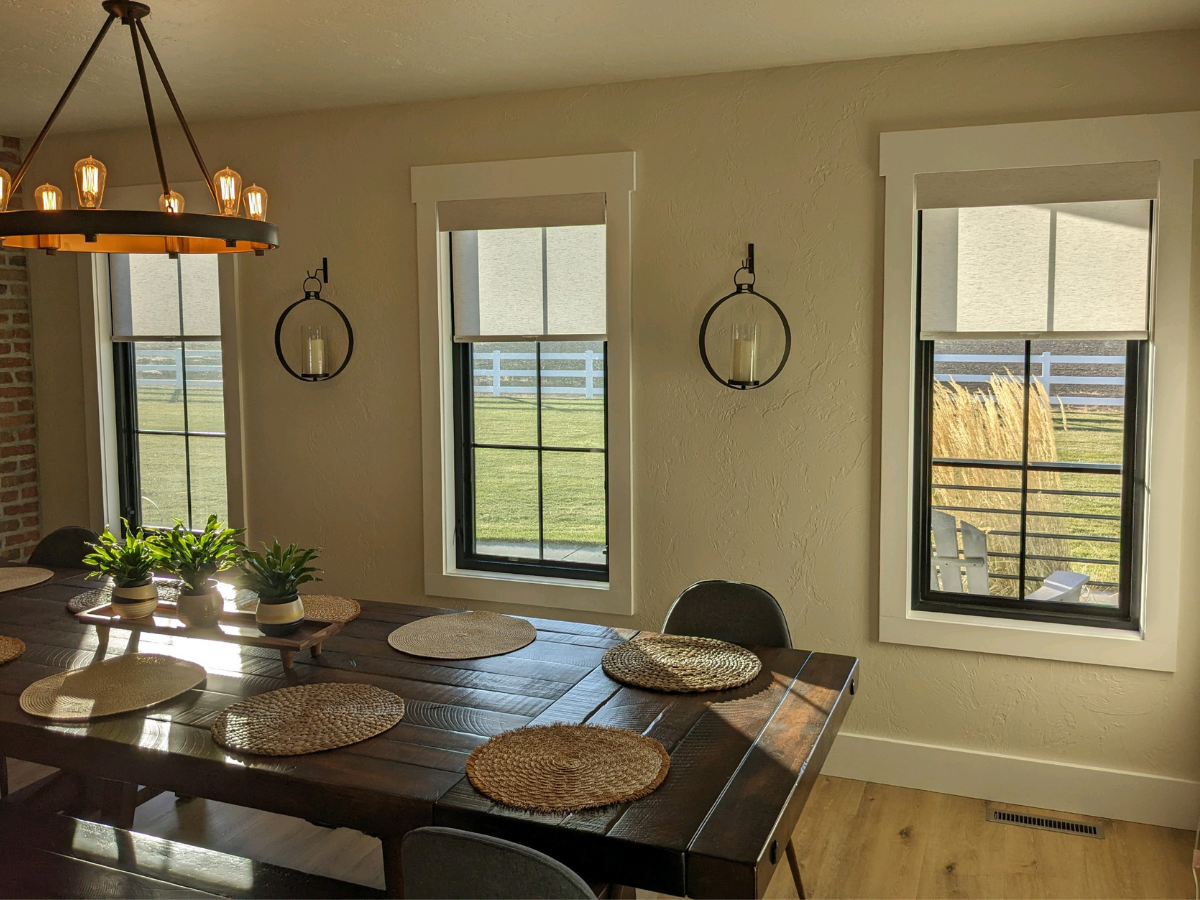 Light filtering roller shades from Budget Blinds of Sheridan & Gillette offer a modern, sleek look compared to other window treatments.