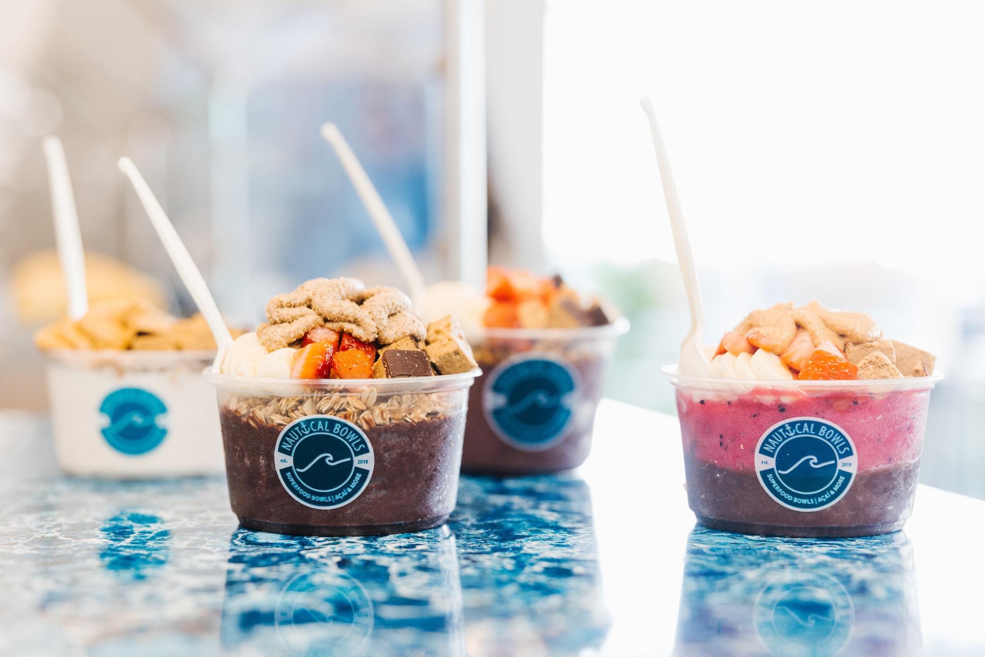 A Nautical Bowls classic! The Nauti Bowl combines Açaí, Pitaya, Freshly Ground Peanut Butter, Crunchy Granola and Cacao Nibs for a full meal filled with flavor. One of the top-selling Signature Bowls, the Nauti Bowl has been a fan-favorite for a healthy breakfast, lunch & post-workout recharge.