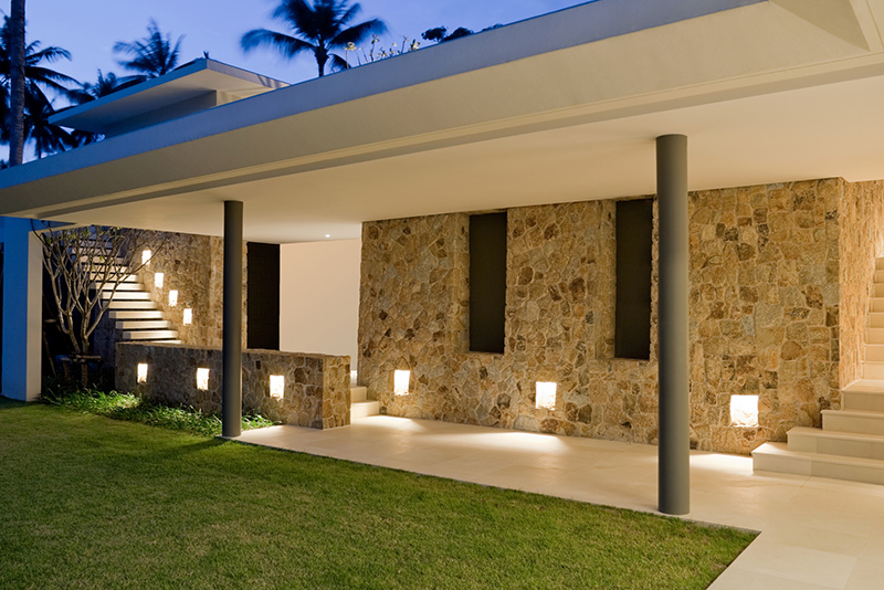 Home with exterior lighting