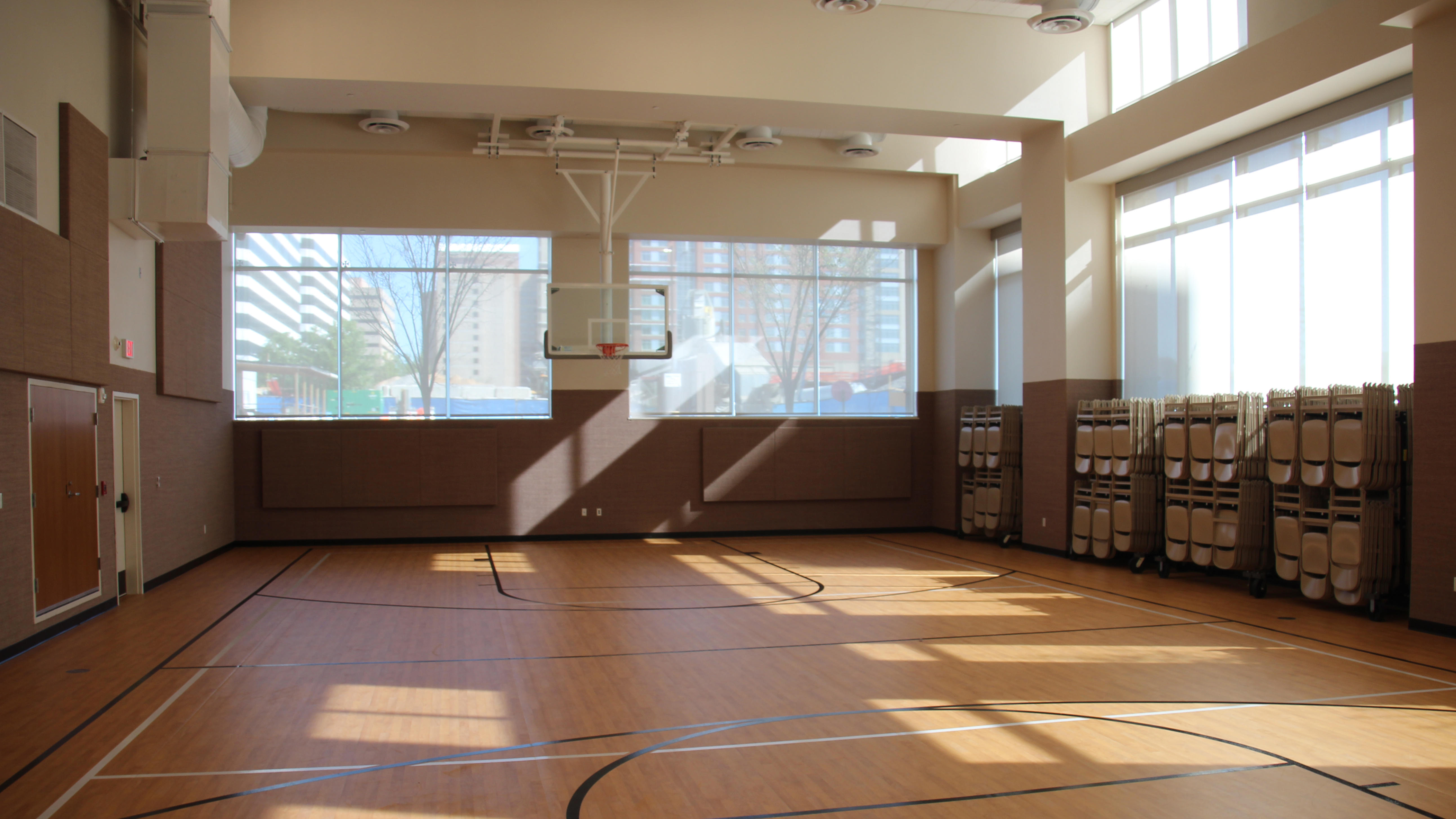 This is the cultural hall. Members and friends join during the week to play basketball, volleyball, or other sports. The room is also used for cultural events and other activities.