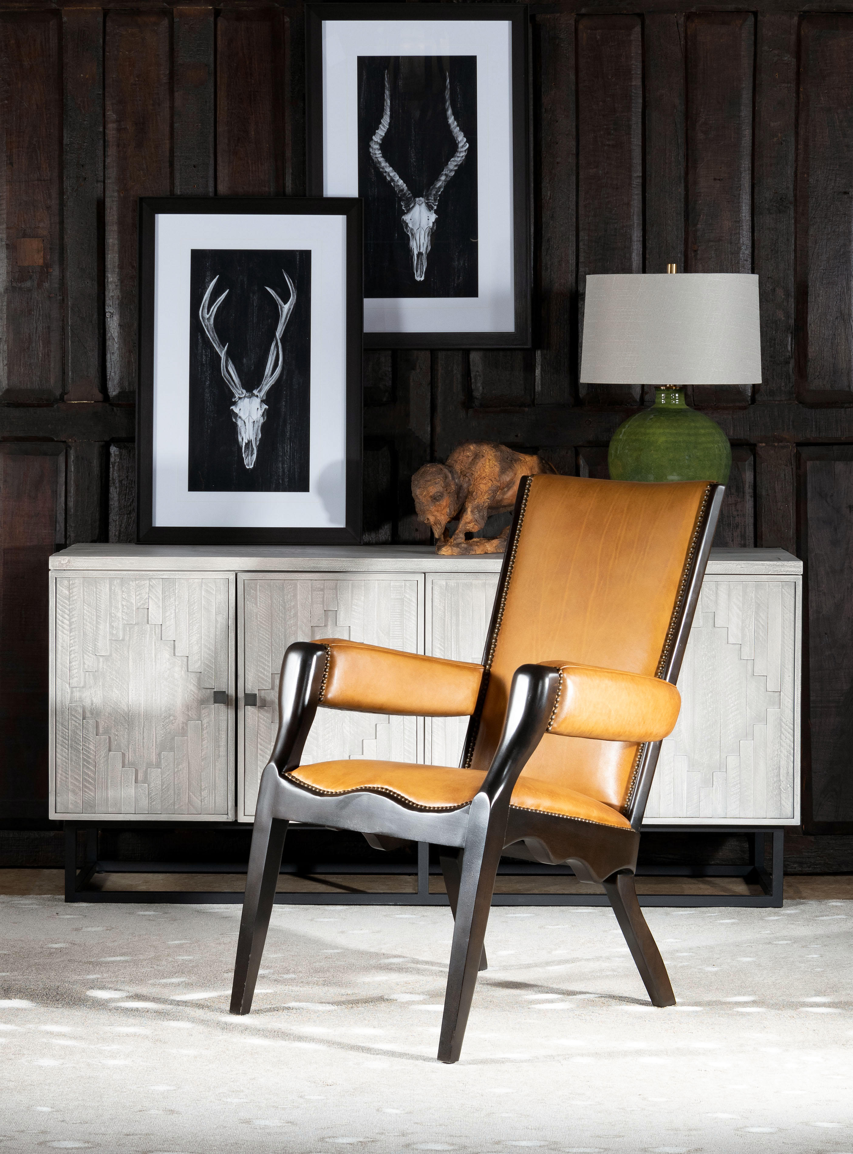 Our Boland Leather Chair is a fine example of modern rustic design. featuring an exceptional artisan leather tanned to the highest standards of quality and then hand antiqued. With Artisan craftsmanship and comfort, these appealing materials blend together to create a centerpiece of any fine deÌcor scheme. This fine leather chair has the perfect pitch for incredible comfort! Our Boland Leather Chair is one of the most eye-catching pieces of modern rustic furniture you will find! 100% American Made to the highest standards of quality and craftsmanship!