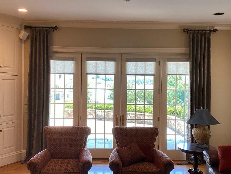 French doors and windows are so elegant—and they add a sense of height to spaces, too. In this home, Budget Blinds of Knoxville & Maryville Knoxville (865)588-3377
