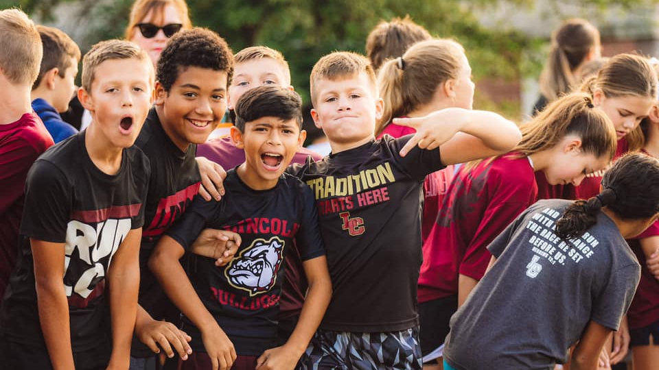 Lincoln Christian School elementary students in parade celebrating championship victory