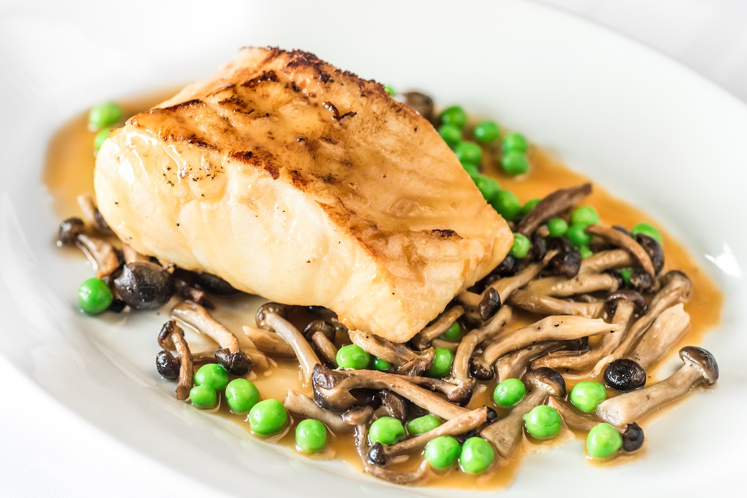 Experience the flavor of our Miso Marinated Chilean Sea Bass, a standout seafood dish featured on th 