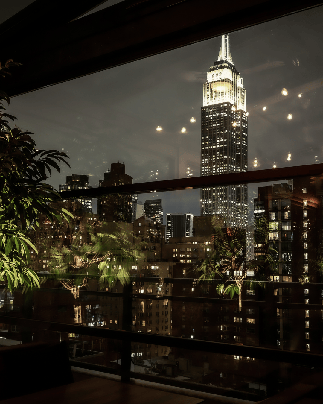 View of Empire State Building from the inside of Vintage Green Rooftop.