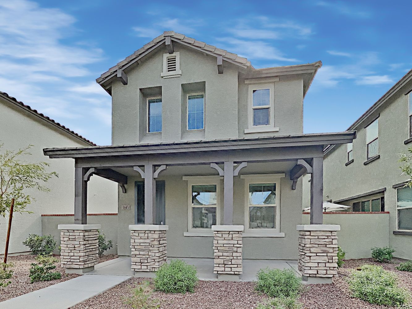 Gorgeous home with covered patio at Invitation Homes Phoenix.